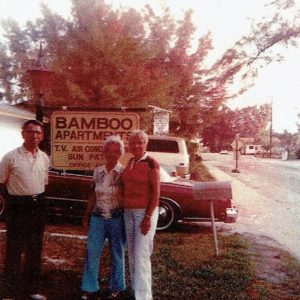 Carmen and Avelino Torres in front of the sign in 1971